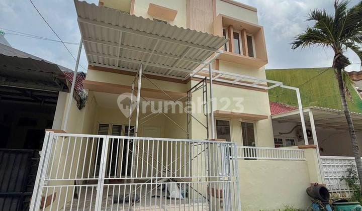 Rumah di Pakuwon City Cluster Griya Asri Sudah Renovasi Strategis