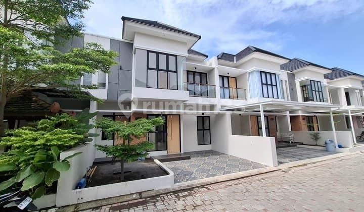 RUMAH MINIMALIS TROPIS PERUMAHAN PRESTISIUS JALIMBAR DEKAT KAMPUS