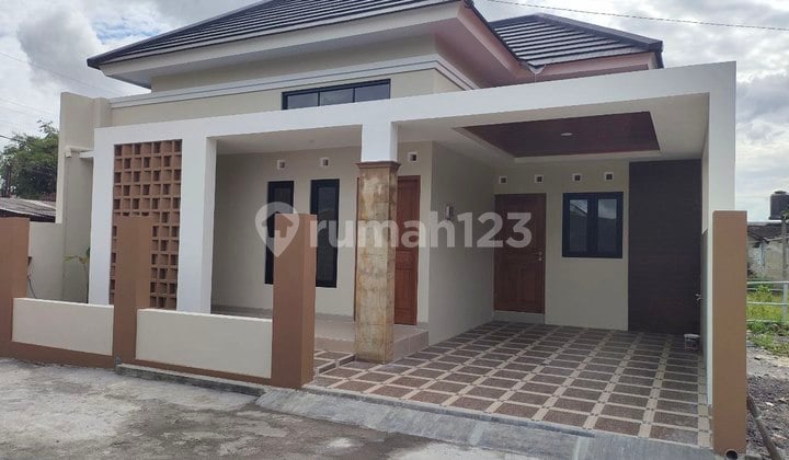 RUMAH MINIMALIS TROPIS SIAP HUNI SAMBISARI PURWOMARTANI SHM KPR