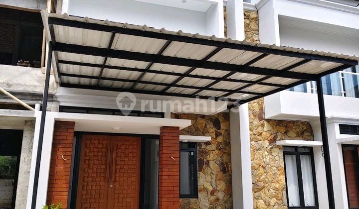 Rumah Bali Modern 2Lantai Bagus SHM Dekat Pintu Tol di Depok.