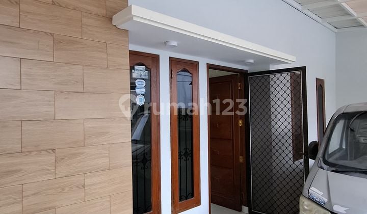 Poris Indah -1 Lantai- Sudah Renovasi - Hadap Selatan - 2 K.tidur- Ada Carport 1 Mobil- Row Jalan 2 Mobil