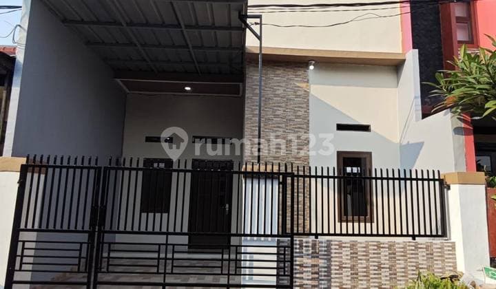 Rumah Minimalis dalam Cluster Taman Duta di Pondok Ungu Permai
