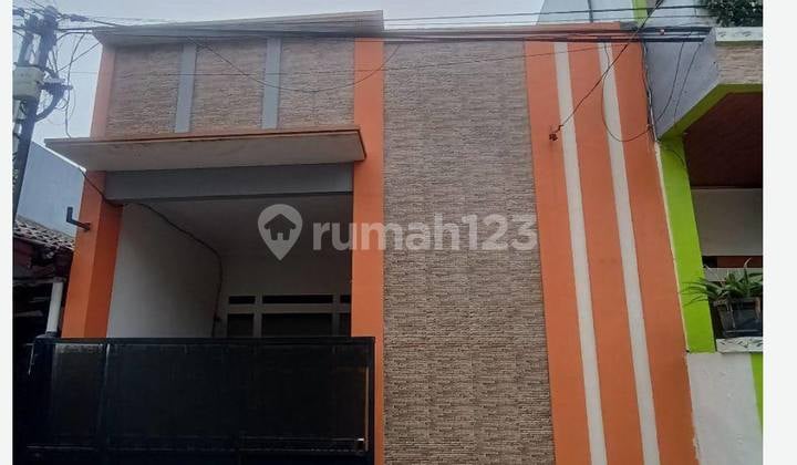 Rumah merah minimalis harga nego di PUP bekasi