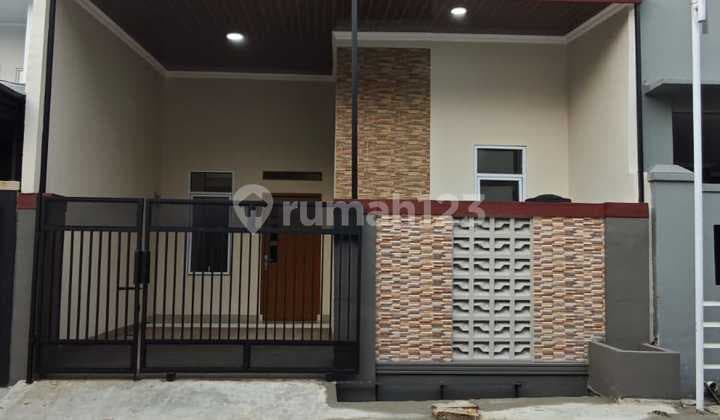 Rumah Coklat Cantik Di Cluster Taman Flora Pondok Ungu Permai