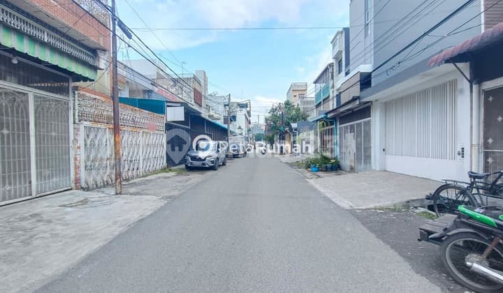 Shop House on Kalimantan Street, Sumatera Area, and Madong Lubis in the City Center