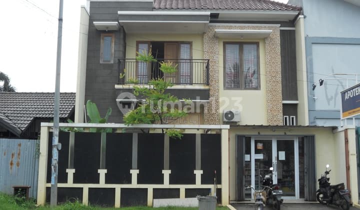 House with Business Kencana Loka BSD City, Strategic Roadside Location, Bustling Area