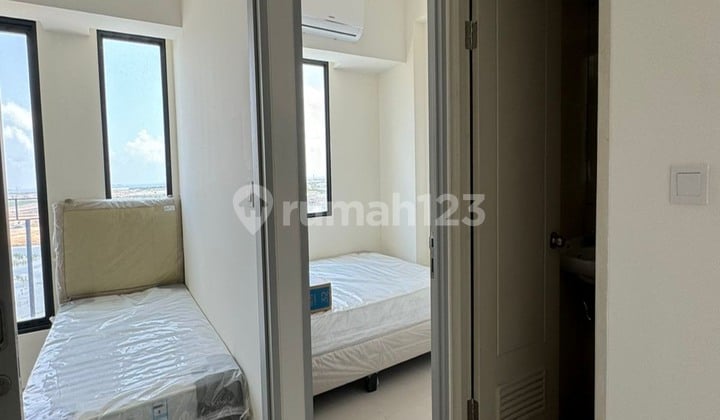 Apartemen Osaka Pik 2 Semi Furnish Ac dan Ranjang Baru
