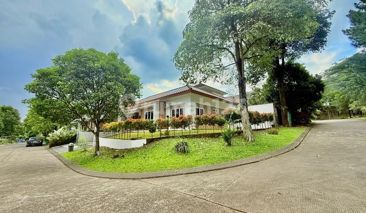 Minimalist House with Side Hook, Playground and Basketball Court in Front Cluster of Sentul City Bogor