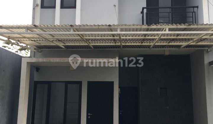 Rumah Dalam Cluster di Sutami