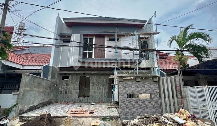 Rumah Baru Modern di Manyar Jaya Praja Hadap Selatan Dekat Untag