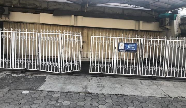 Raya Ngagel Jaya, komersial ramai jalan kembar strategis