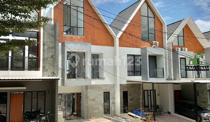 Rumah 3 Lantai Berkonsep Scandinavian Modern di Jalan Raya Muhtar