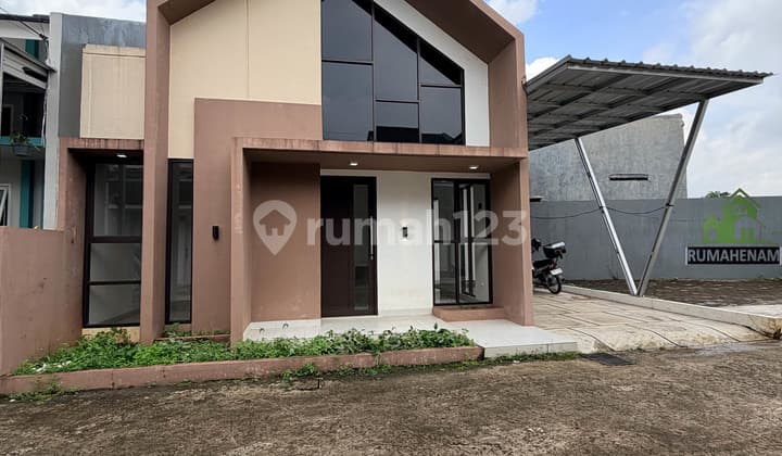 Rumah dengan Tanah Lus 116 Meter Pojok Dekat Terml Transjakarta