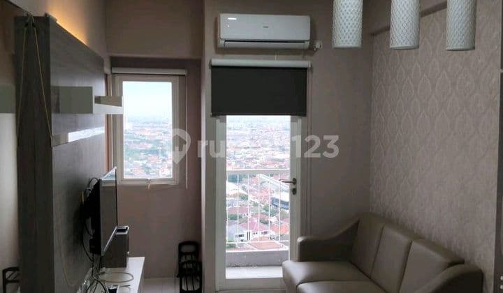 Apartemen Puncak Dharmahusada 2 Kamar Full Perabot Bagus Bersih