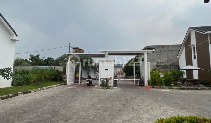 Rumah di Megah Aryana Karawaci 2 Lantai SHM Bagus Timur