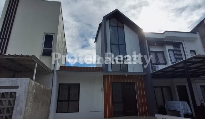 Rumah Dengan Desain Minimalis Modern Di Reni Jaya, Pamulang