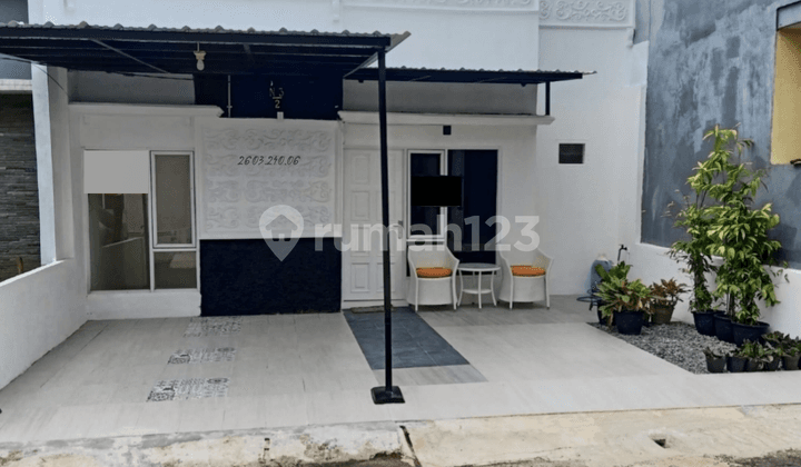 Rumah Siap Huni Dalam Cluster di Griya Suradita Indah