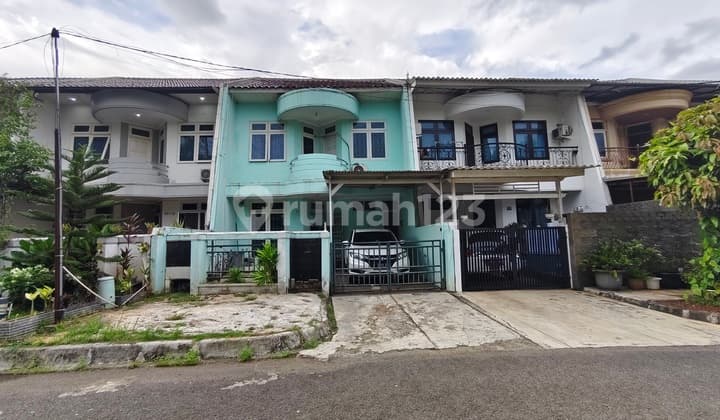 Rumah Taman Bunga di Kota Modern