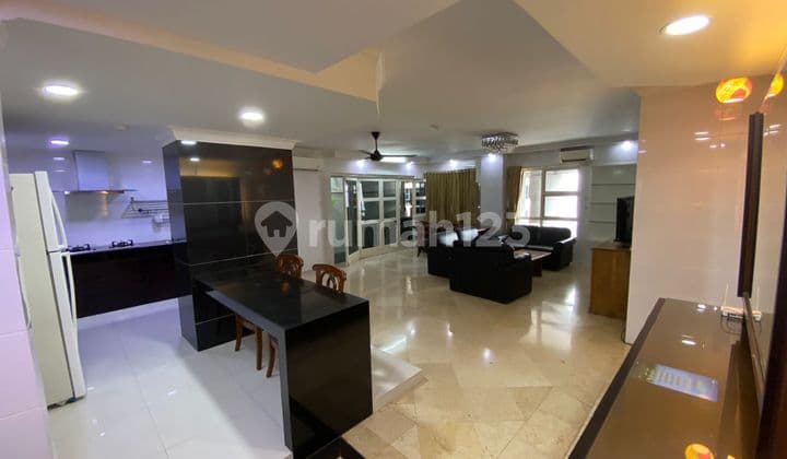 Jual Apartemen Grand Tropic Full Furnished Lantai Sedang