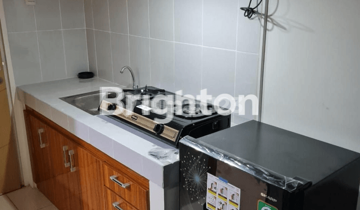 Ready-to-occupy affordable apartment in Bale Hinggil, Merr Rungkut, Surabaya. Fully furnished. Close to Wonokromo, Nginden, Jemursari, Waru.