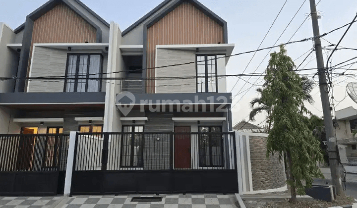 Rumah Baru Gress 2 lantai Scandinavian Luxury Lokasi Premium Sutorejo Prima depan Lap. Tennis