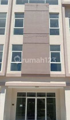 4-STORY RUKO PUNCAK DHARMAHUSADA SURABAYA FRONTING 2-LANE ROAD