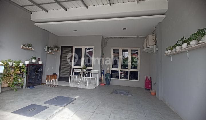 Rumah 1.5.Lantai Nirwana Eksekutif Rungkut Surabaya Siap Huni