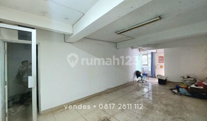 Minimalist 2-Story House in Green Garden Needs Renovation