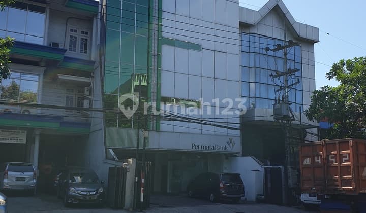 Gedung 4lantai dgn parkir basement dekat pelabuhan