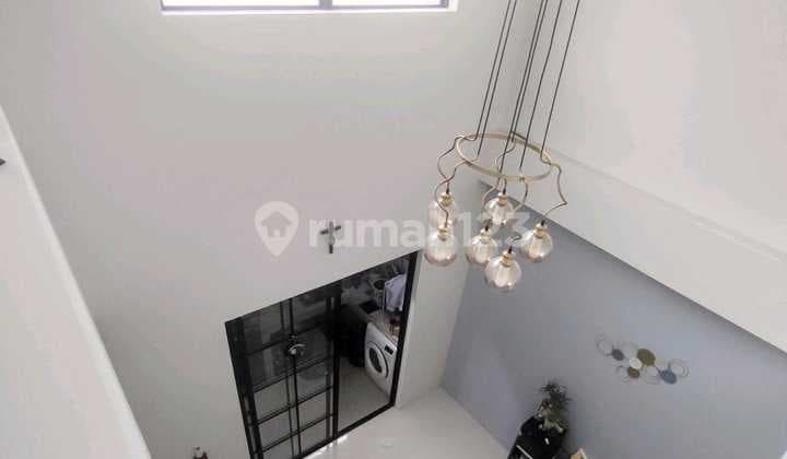 RUMAH MINIMALIS GRAHA NATURA SURABAYA STRATEGIS NYAMAN VIN.A448