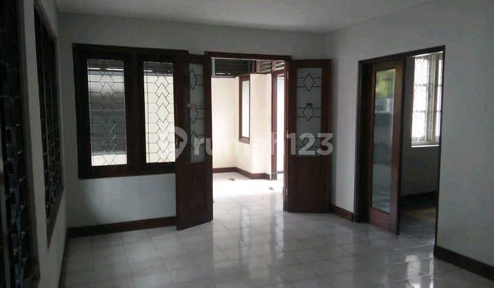 House on Jl Kh Misbakh, Prime Location Near Darmo Main Road