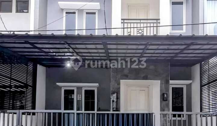 Rumah Di Citra Grand, Rapih Dan Siap Huni