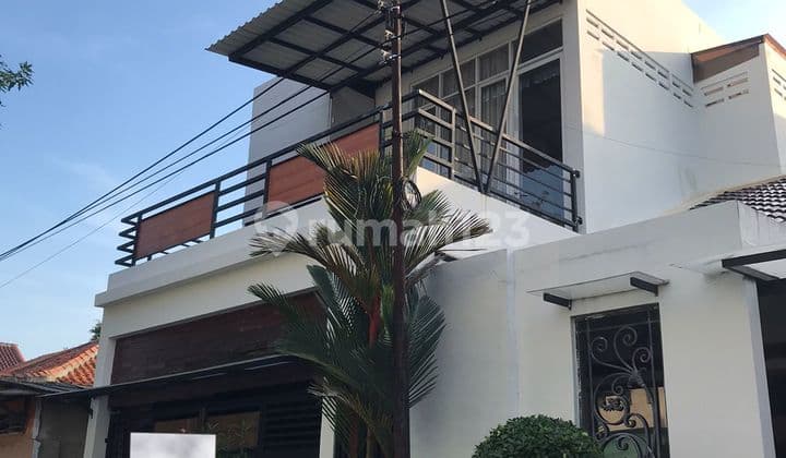 A 1.5-Story Move-In Ready House in Cirebon with a Fish Pond.