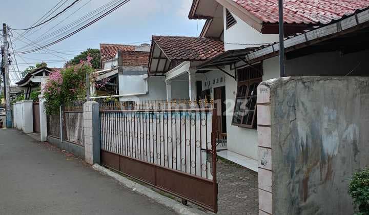 Rumah tua dengan tanah 255m2 diHarjamukti Cimanggis Depok