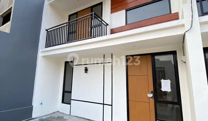 Rumah Konsep Mezanine tanah luas 90 m di Kota Depok di Cipayung