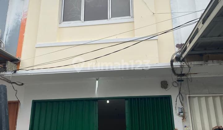 Translation: "For Sale: 2-Story Shop House in Poris Paradise, Suitable for Business, Clinic, Pharmacy, etc."