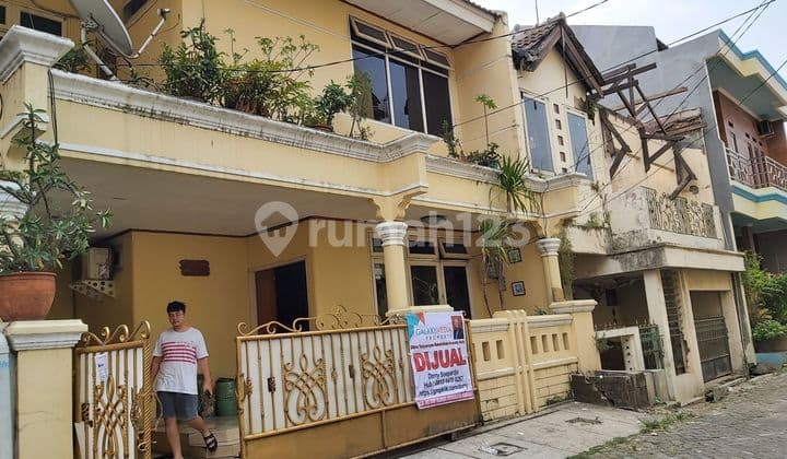 Two-Story House with SHM Needs Renovation East in the Center of Bekasi City