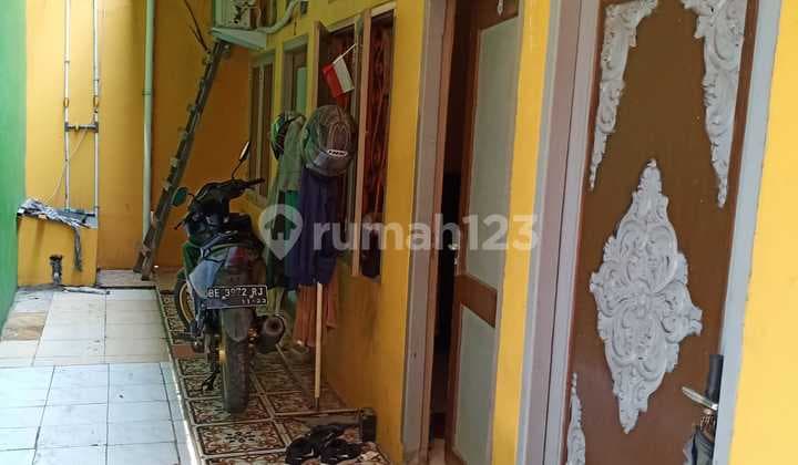 Dijual rumah kontrakan & kios di Perumnas Tangerang