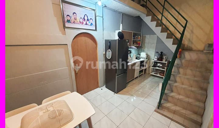 Dhyana 9x22m2 House in Arwana Jembatan Dua complex