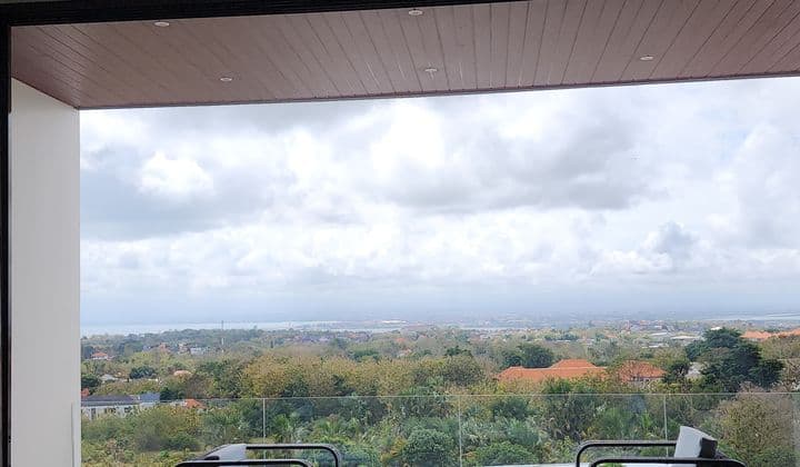 For Sale Luxury Villa in Jimbaran with Spectacular Views of Airport, Sea, Highway, and Mountain- 4-Story Building- Land Area 300 m2- Building Area 550 m2- Views of Airport, Highway, Sea, and Mountain- 3 Bedrooms- 4 Bathrooms- 2 Living Rooms- Large Rooftop with Full View- Kitchen